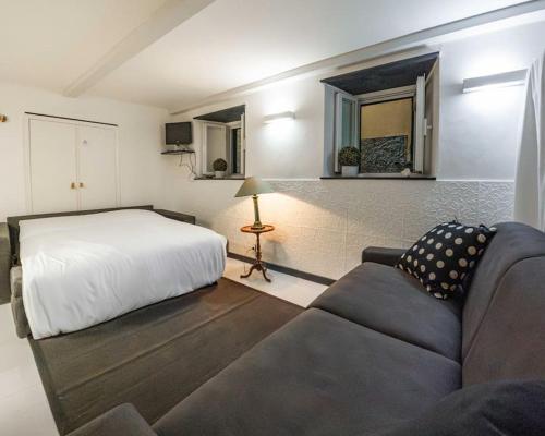 Tempat tidur dalam kamar di [50 metri dal mare]-wifi-cucina