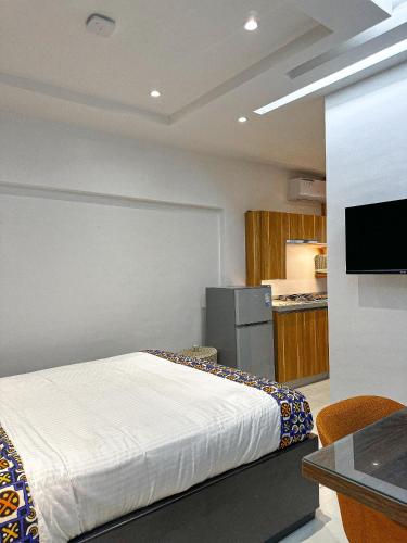 Kuchyň nebo kuchyňský kout v ubytování Klik Klak Appart Hotel