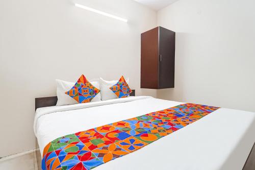Postel nebo postele na pokoji v ubytování FabExpress Epic Residency - Nr SRM University, Ramapuram