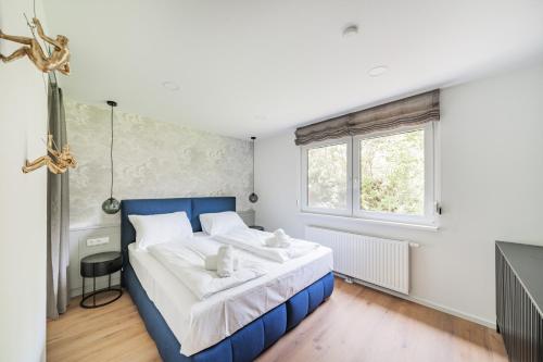 Cama o camas de una habitación en Das Haidensee
