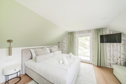 Cama o camas de una habitación en Das Haidensee