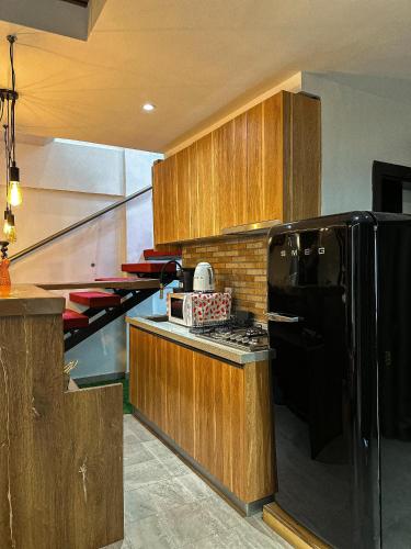 Kuchyň nebo kuchyňský kout v ubytování Klik Klak Appart Hotel