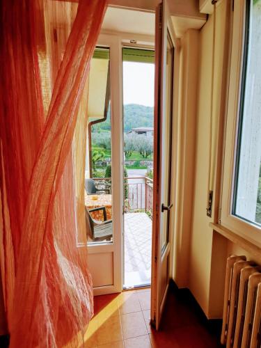an open door with a view of a balcony at Ristorante Le Rasole in Garda