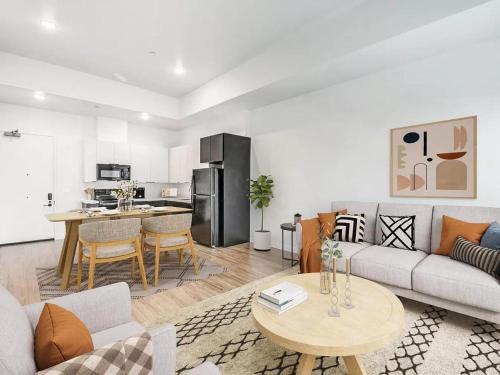 a living room with a couch and a table at Golden west homes in Yauco