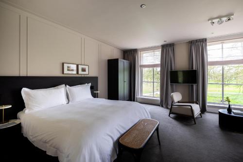Katil atau katil-katil dalam bilik di Pillows Luxury Boutique Hotel aan de IJssel