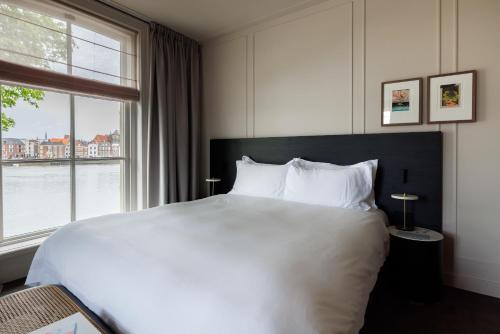 Katil atau katil-katil dalam bilik di Pillows Luxury Boutique Hotel aan de IJssel