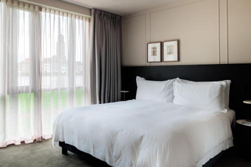 Katil atau katil-katil dalam bilik di Pillows Luxury Boutique Hotel aan de IJssel