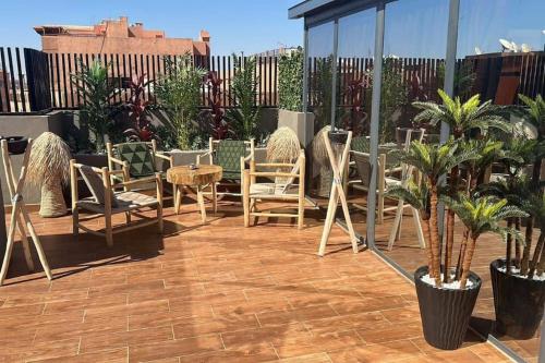 Photo de la galerie de l'établissement Appartement Luxueux au Rooftop à Guéliz, à Marrakech
