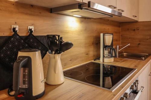 Dapur atau dapur kecil di Zentrales Appartement im Alpin-Style in Garmisch