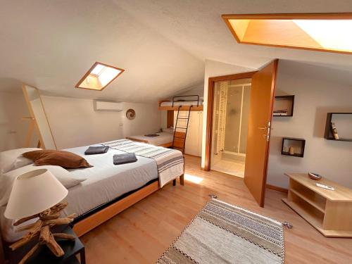 Postelja oz. postelje v sobi nastanitve Camping Italia'90 Apartment two levels