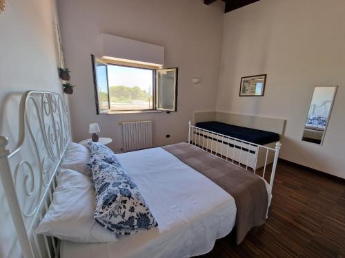 Postel nebo postele na pokoji v ubytování B&B Valleluna