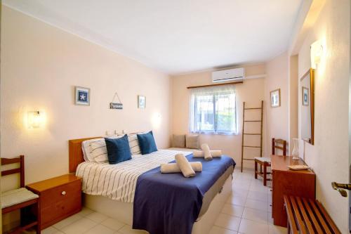 Ένα ή περισσότερα κρεβάτια σε δωμάτιο στο Quinta Nova Hideaway - Alvor