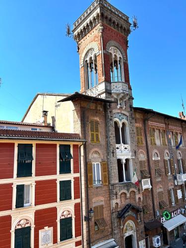 an old building with a clock tower on top of it at La bella vista in Sestri Levante