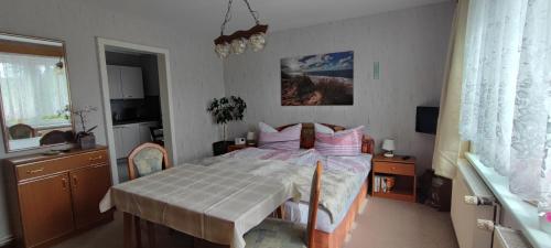 מיטה או מיטות בחדר ב-Labahn