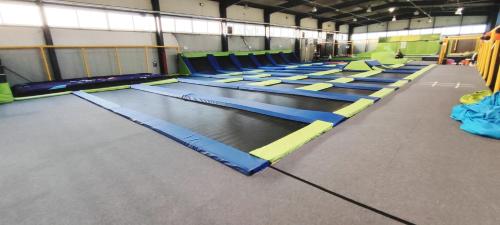 a row of trampolines in a gym at lemon in Mielec