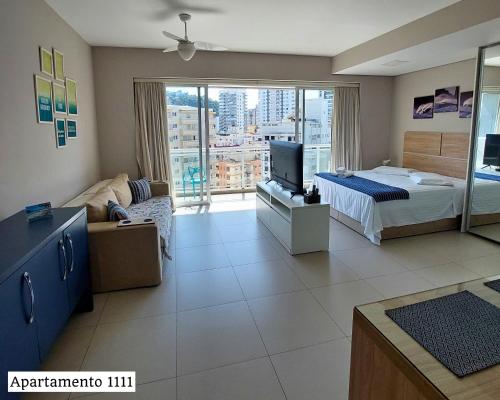 Postel nebo postele na pokoji v ubytování Book Santos - Condomínio Unlimited - Apartamento com Vista Mar e Apartamento com Vista Piscina