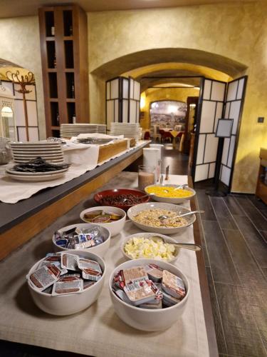 a buffet line with many different types of food at Hotel Bernarda in Varaždinske Toplice