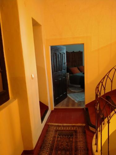 Una cama o camas en una habitación de chambres d'hôtes l'atrium