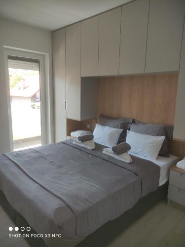 Katil atau katil-katil dalam bilik di Central Lux ( U CENTRU GRADA, 30m od SPA centra)