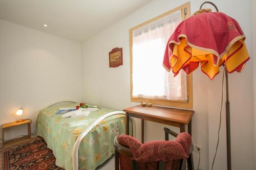Postel nebo postele na pokoji v ubytování Ca' Melin - Happy Rentals