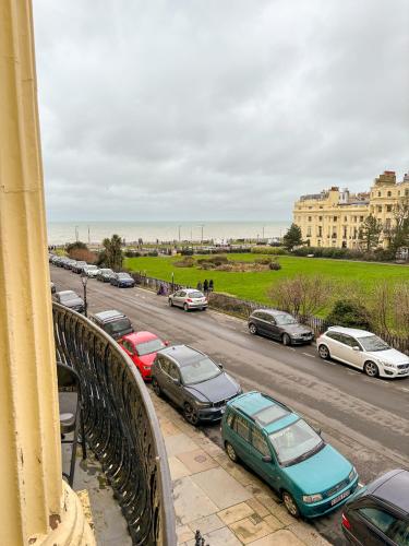 a view from a balcony of cars parked on a road at X Hotel Brunswick Square in Brighton & Hove
