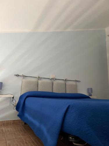 Una cama o camas en una habitación de La Lestra