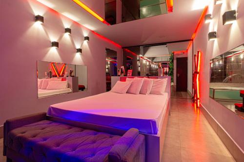 Postel nebo postele na pokoji v ubytování Point Motel GRU