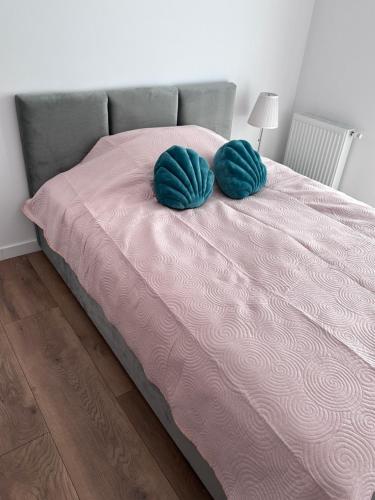 Łóżko lub łóżka w pokoju w obiekcie Apartament Chełm