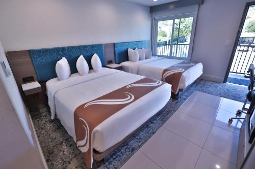 Katil atau katil-katil dalam bilik di Rodeway Inn San Clemente
