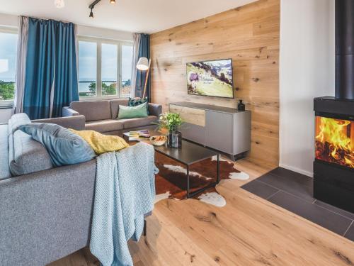 Μια τηλεόραση ή/και κέντρο ψυχαγωγίας στο Apartment Mariandl am Meer-4 by Interhome