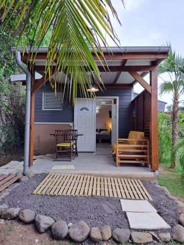 a porch of a house with a patio at ZimZim in Le Gosier