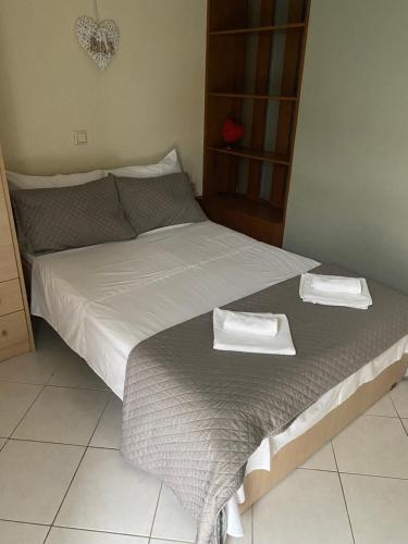 Llit o llits en una habitació de New lovely apartment in Heraklion