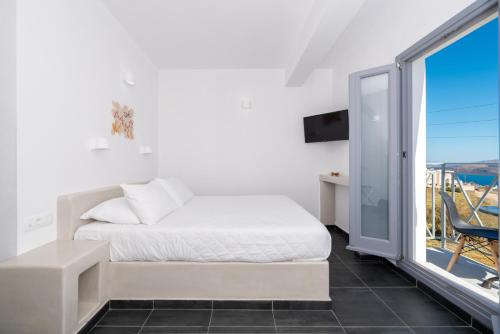 Katil atau katil-katil dalam bilik di Pancratium Villas & Suites