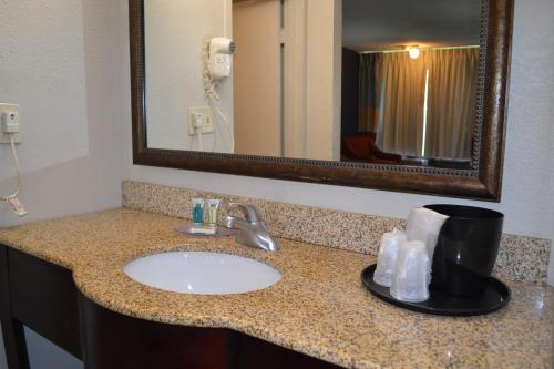 A bathroom at Dayspring Extended Stay