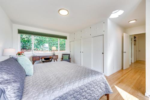 a bedroom with a large bed and a desk at Mill Valley Home 5 Mi to Golden Gate Bridge! in Mill Valley