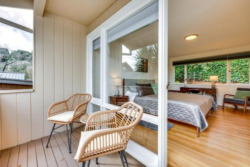 a bedroom with a bed and two chairs and a window at Mill Valley Home 5 Mi to Golden Gate Bridge! in Mill Valley