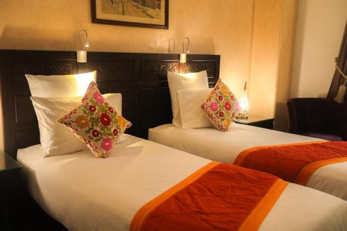 Riad Perle D'Eauにあるベッド