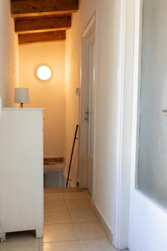 a bathroom with a bath tub in a room at Camera tra le Cinque Terre, Camogli e Portofino. Vista valle e scorcio mare all'orizzonte in Castiglione Chiavarese