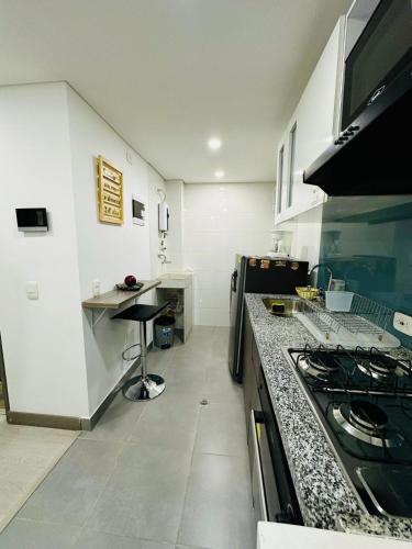 Η κουζίνα ή μικρή κουζίνα στο Magnifico y Confortable Apartamento Amoblado