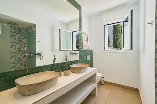 Ванна кімната в Gran Villa Apart Malaga