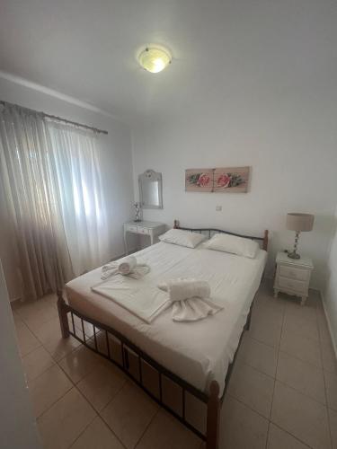 Ένα ή περισσότερα κρεβάτια σε δωμάτιο στο Apartment by the sea