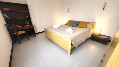 Katil atau katil-katil dalam bilik di Villa Isola Bella - Appartamento Vintage