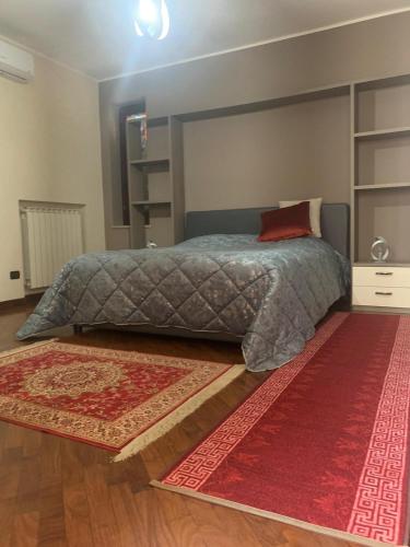 Ένα ή περισσότερα κρεβάτια σε δωμάτιο στο Villa D&C casa affitto breve