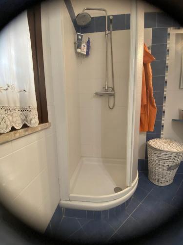 a shower in a bathroom with a shower at Casa Emma in Favignana