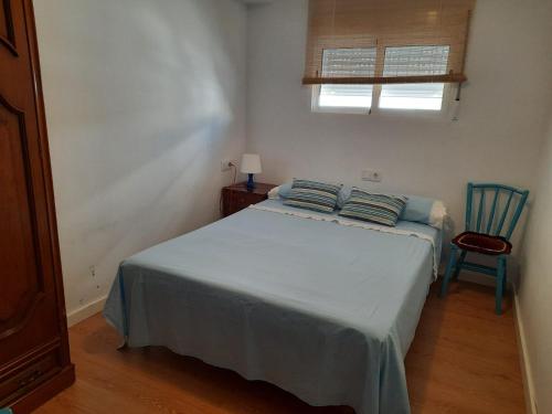 Cama o camas de una habitación en OLIVA WIFI HOME