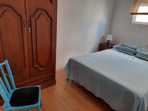Cama o camas de una habitación en OLIVA WIFI HOME