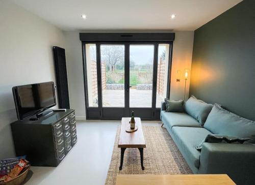 Posezení v ubytování Logement N2 tout confort - proche de Giverny