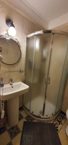 a bathroom with a shower and a sink at Affittacamere Museo in Taranto