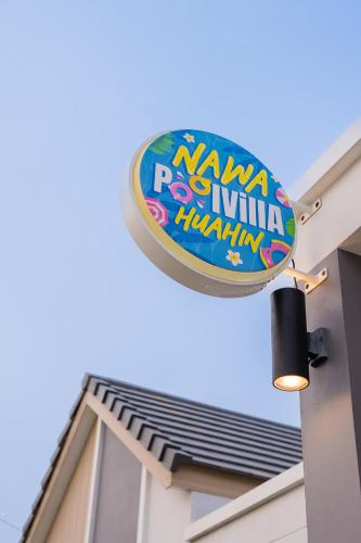 a sign for a kawana gorilla institution on a building at นาวาพูลวิลล่าหัวหิน VIP in Hua Hin