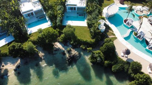 an aerial view of a resort with a pool at Ycona Eco-Luxury Resort, Zanzibar in Dikoni